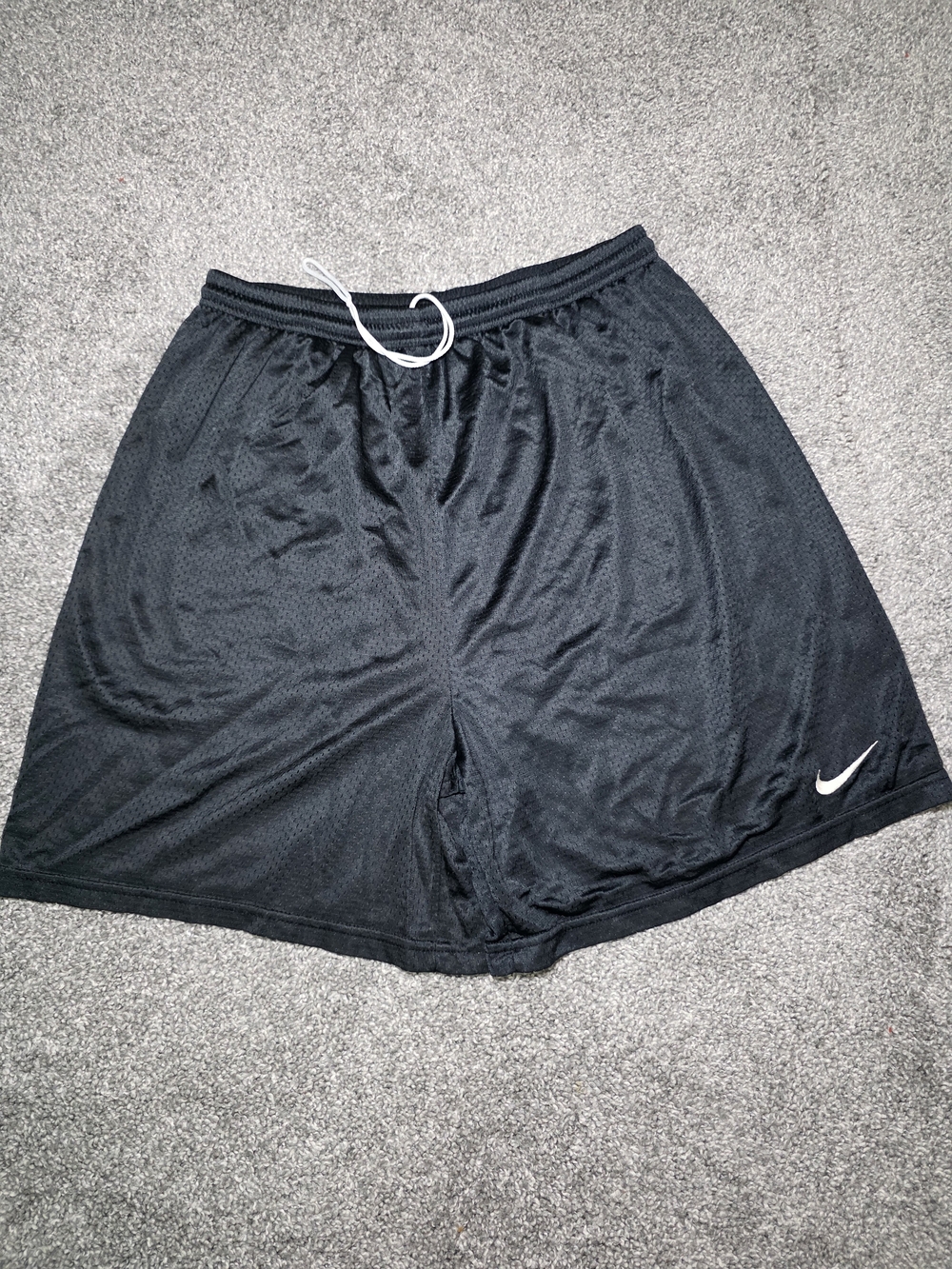 Nike Men’s Black Athletic Mesh Shorts with White Swoosh
